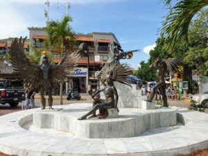 Roundabout with mayan statues