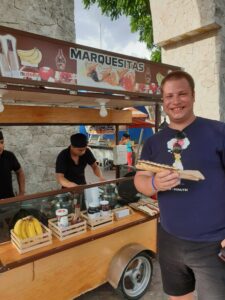 A person eating marquesita