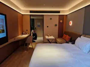 Orange Hotel Yangshuo bedroom view