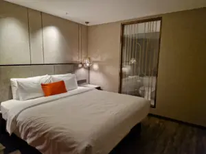Yitel Premium Shanghai bedroom with bathroom view
