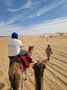 Sahara camel ride to Arawan Luxury Desrt Camp